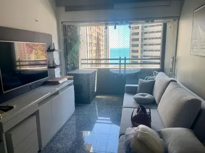 Uma área de estar em Flat-Apartamento- Moderno e Lindo - Vista Beira Mar