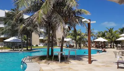 A piscina em ou perto de Apartamento á Beira Mar no Porto das Dunas, Aquiraz - Perto do Beach Park