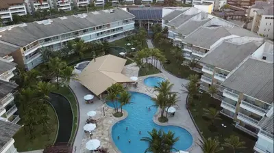 A piscina em ou perto de Apartamento á Beira Mar no Porto das Dunas, Aquiraz - Perto do Beach Park
