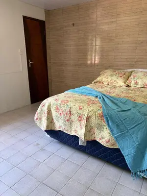 Uma cama ou camas num quarto em Casa da Ana