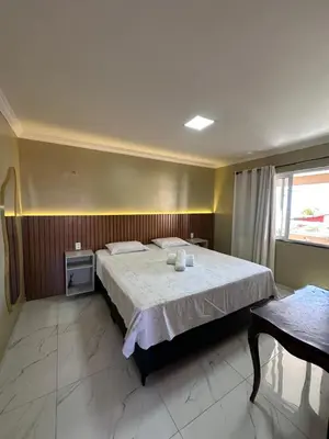 Uma cama ou camas num quarto em Residência Lugnier