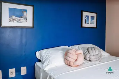 Uma cama ou camas num quarto em Loft Praia by Holiday Stays