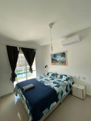 Uma cama ou camas num quarto em VgFun Luxury