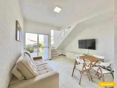 Uma televisão e/ou sistema de entretenimento em Beach Townhouses IV