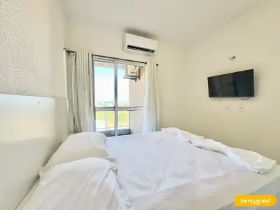 Uma cama ou camas num quarto em Beach Townhouses V