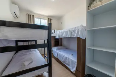 Uma cama ou camas num quarto em Mirante #705 - Fortaleza Por Carpediem