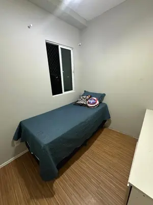 Uma cama ou camas num quarto em Apartamento com 3 quartos