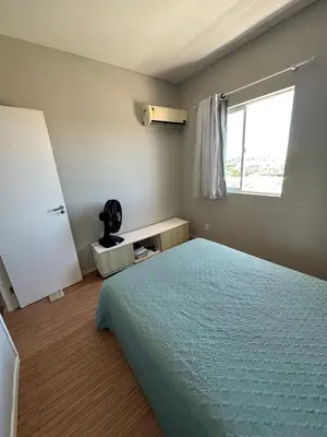 Uma cama ou camas num quarto em Apartamento com 3 quartos
