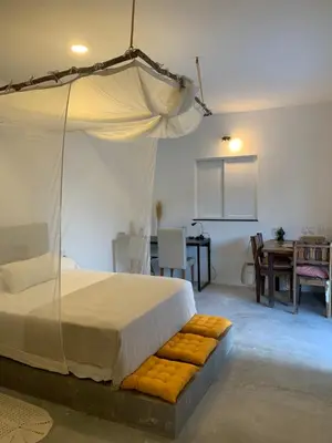 Uma cama ou camas num quarto em Casa Mantra