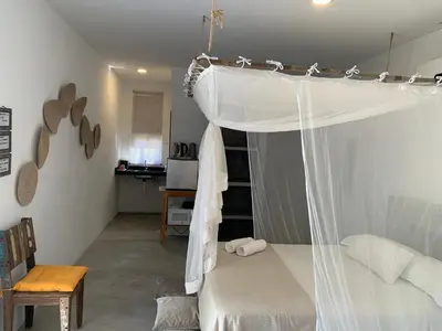Uma cama ou camas num quarto em Casa Mantra
