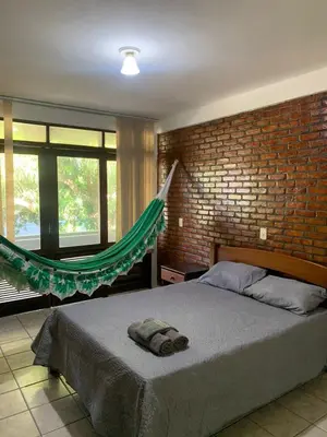 Uma cama ou camas num quarto em Casa de Campo