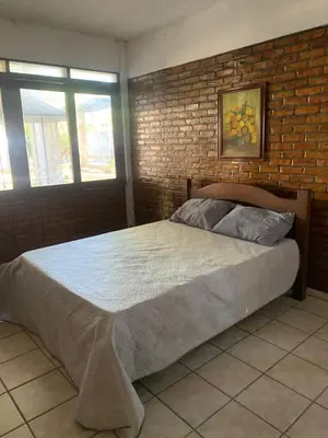 Uma cama ou camas num quarto em Casa de Campo