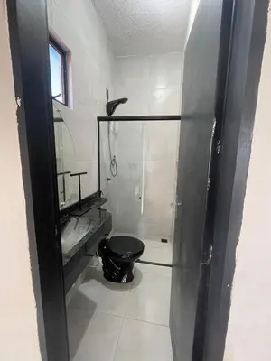 Uma casa de banho em Taiba House