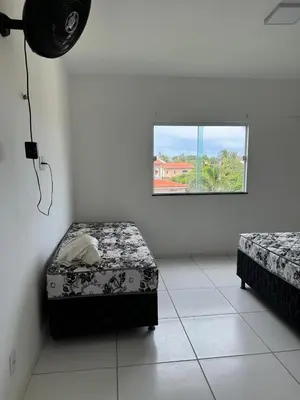 Uma cama ou camas num quarto em Casa Paraiso