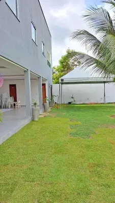 Um jardim no exterior de Casa Paraiso