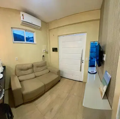 Uma área de estar em Apartamento refúgio