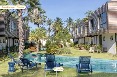 A piscina em ou perto de Duplex luxo em condomínio ao lado da praia