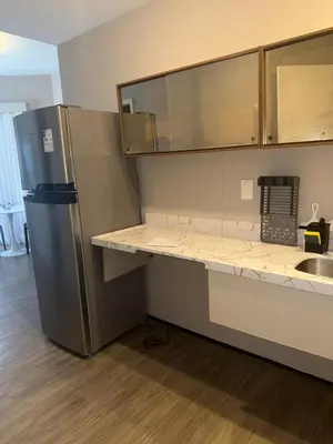 A cozinha ou kitchenette de 1155 golden 55m2 1 quarto frente mar avenida beira mar