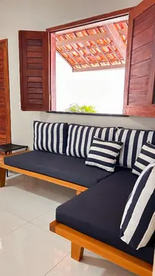 Uma área de estar em CASA COM 04 QUARTOS 04 BANHEIROS PRAIA do PREÁ