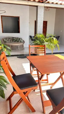 Uma área de estar em CASA COM 04 QUARTOS 04 BANHEIROS PRAIA do PREÁ