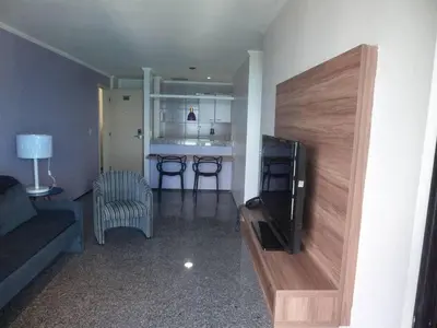 Uma área de estar em Spazzio Residence