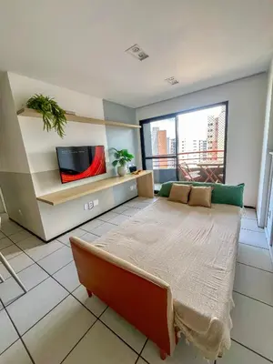 Uma televisão e/ou sistema de entretenimento em Apt Vista Mar