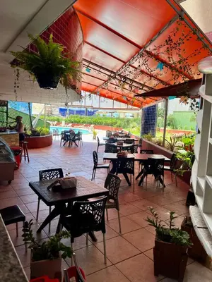 Um restaurante ou outro lugar para comer em Apt Vista Mar