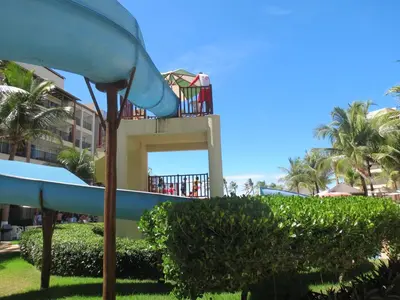 Um jardim no exterior de Conforto e Lazer na Frente do Mar ao Lado do Beach Park