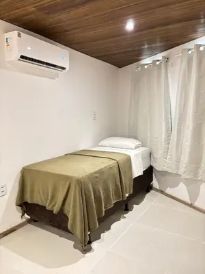 Uma cama ou camas num quarto em Casa Manari