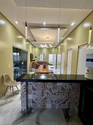 Uma área de estar em Casa no paraíso para temporada
