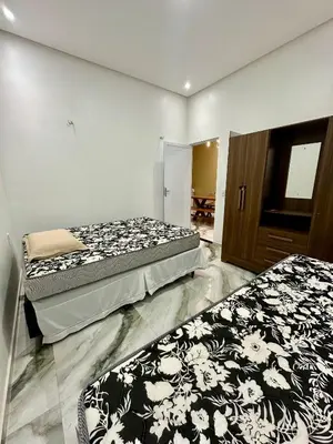 Uma cama ou camas num quarto em Casa no paraíso para temporada