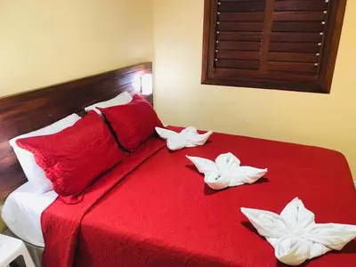 Uma cama ou camas num quarto em Paraíso em Flecheiras