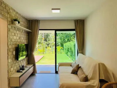 Uma televisão e/ou sistema de entretenimento em Apart Serra Bella Guaramiranga