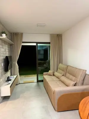 Uma área de estar em Apart Serra Bella Guaramiranga
