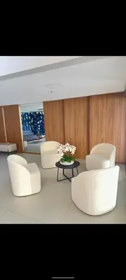 Uma área de estar em Apartamento por temporada Edifício Amazonas