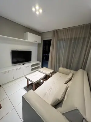 Uma televisão e/ou sistema de entretenimento em Apto Beverly Hills Residence, próx Beach Park