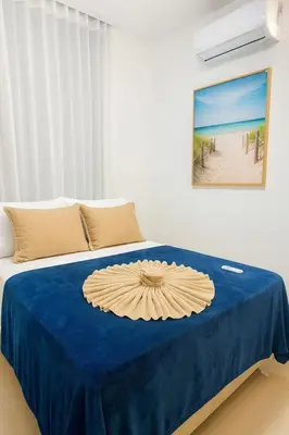 Uma cama ou camas num quarto em VGFUN-447 3 quartos 2 wcs Vista Mar Pé na Areia Praia do Futuro