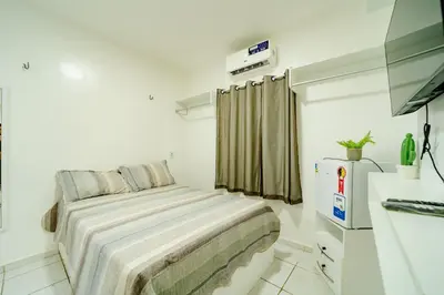 Uma cama ou camas num quarto em Flat Pet Friendly prox ao Aeroporto
