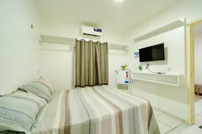 Uma cama ou camas num quarto em Flat Pet Friendly prox ao Aeroporto