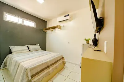 Uma cama ou camas num quarto em Flat para 2 Pessoas a poucos metros do Aeroporto