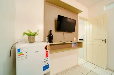 A cozinha ou kitchenette de Flat para 2 Pessoas a poucos metros do Aeroporto