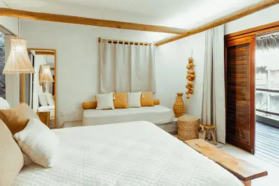 Uma cama ou camas num quarto em Kalit Hotel