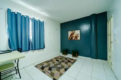 Uma cama ou camas num quarto em Flat com Wi-Fi a Poucos Metros do Aeroporto