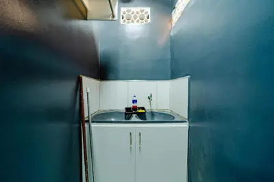 A cozinha ou kitchenette de Flat c Wi-Fi e Smart TV Perto do Aeroporto