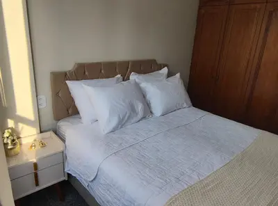 Uma cama ou camas num quarto em Flat Mar Premium 1408