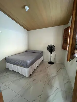 Uma cama ou camas num quarto em Casa Mirante da Serra Guaramiranga