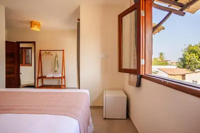 Uma cama ou camas num quarto em Vila Dádiva Jeri