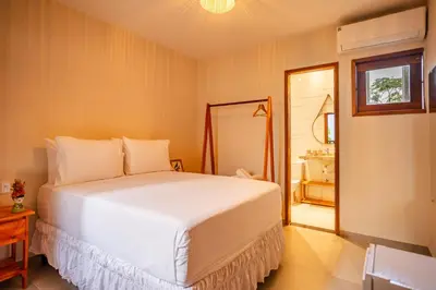 Uma cama ou camas num quarto em Vila Dádiva Jeri