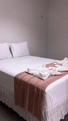 Uma cama ou camas num quarto em Vila Dádiva Jeri