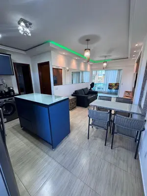 Uma área de estar em Elegance Residences Cumbuco